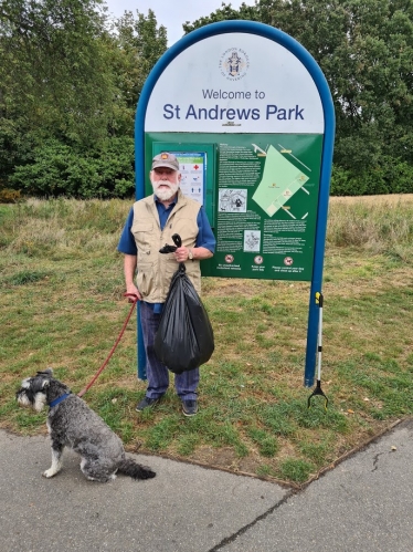 Cllr John Mylod litter picking in St. Andrew's Park